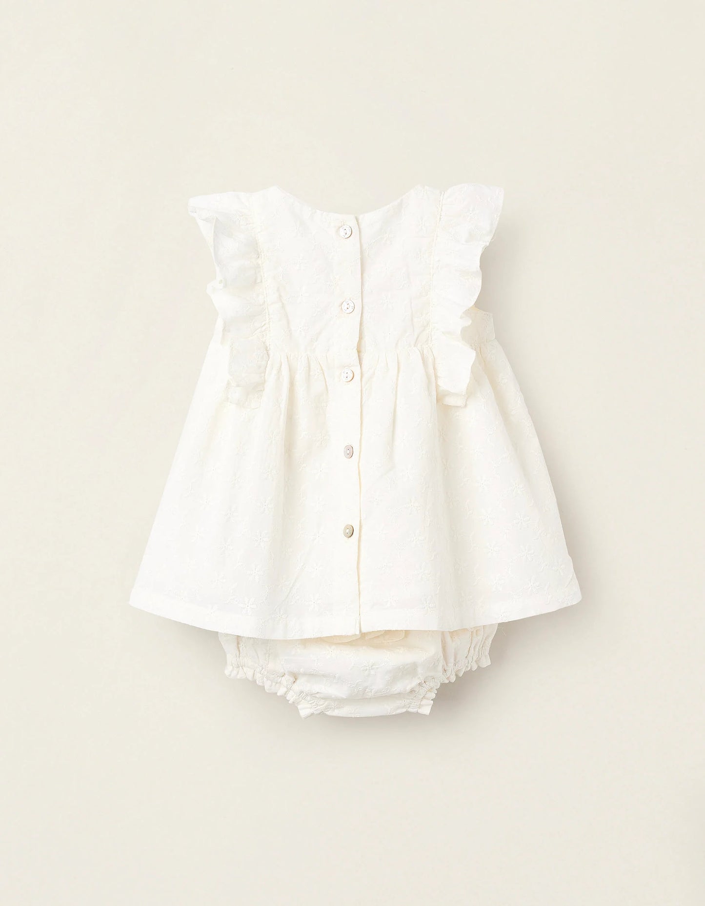 Vestito con volant e ricami neonata