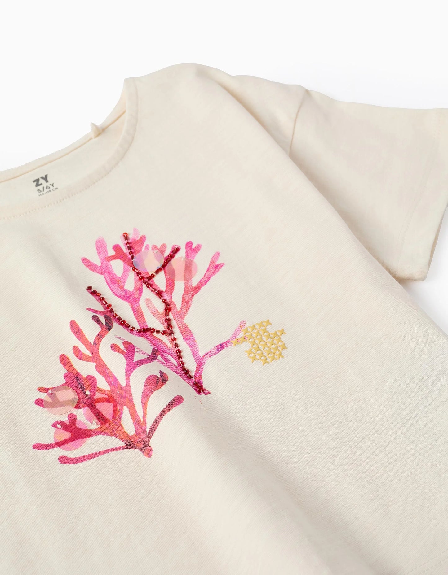 T-shirt in cotone con paillettes e perline