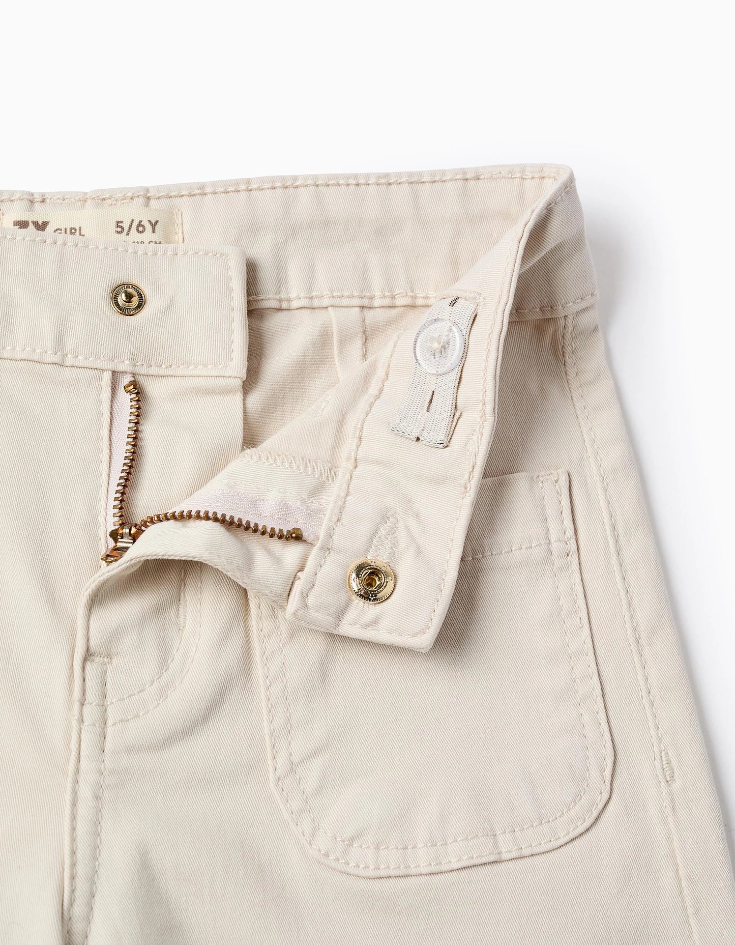 Pantaloni con ricamo a punto croce