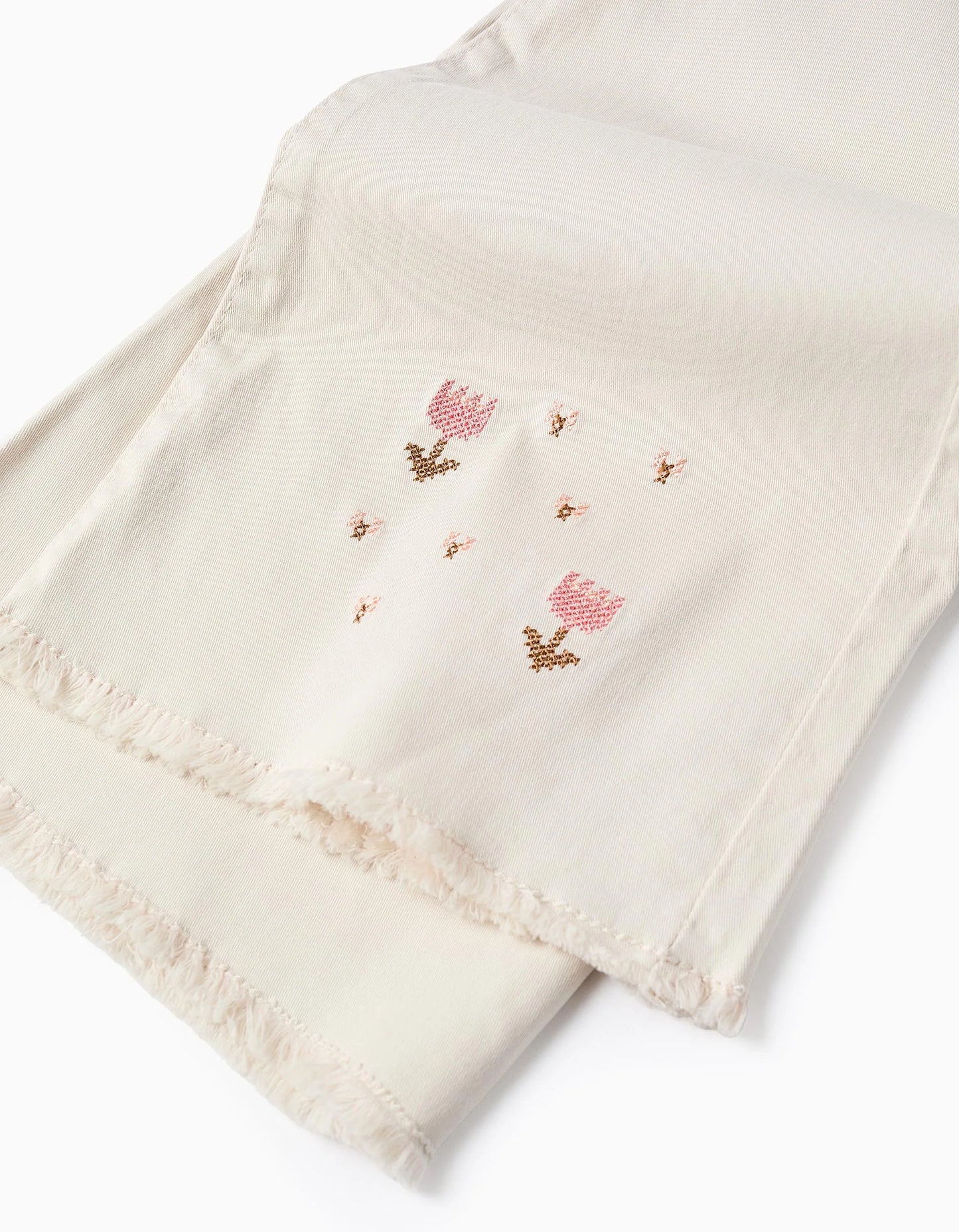 Pantaloni con ricamo a punto croce