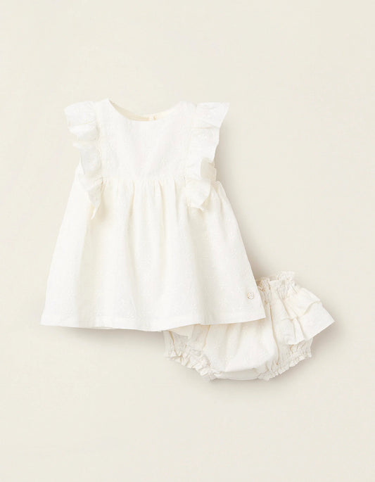 Vestito con volant e ricami neonata