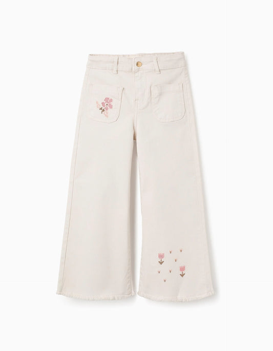 Pantaloni con ricamo a punto croce